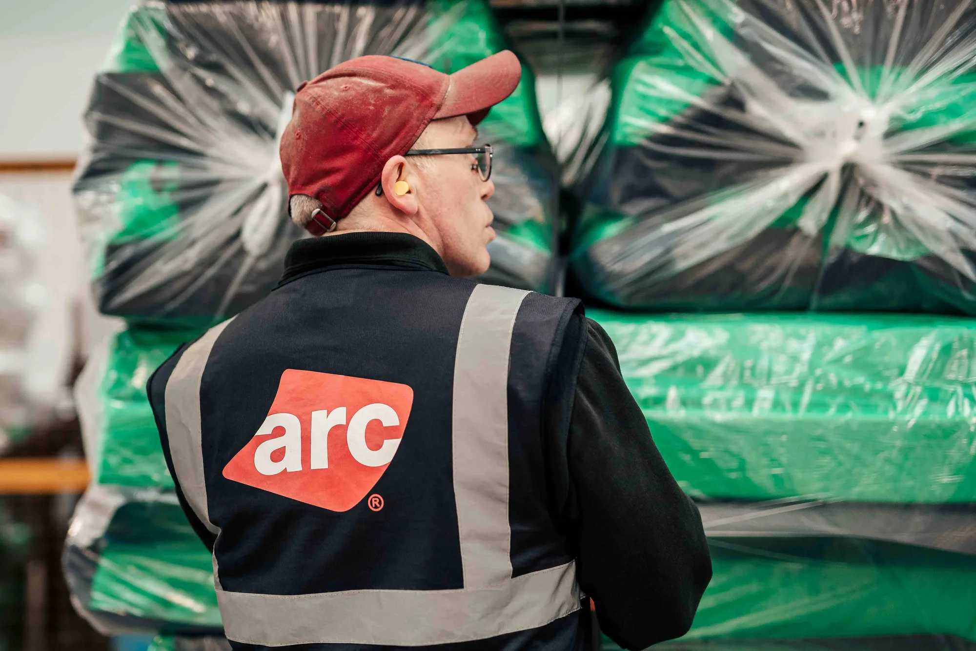 ARC Building Solutions team member at its manufacturing facility
